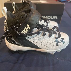 Brand new Under Armor baseball cleats . New never worn